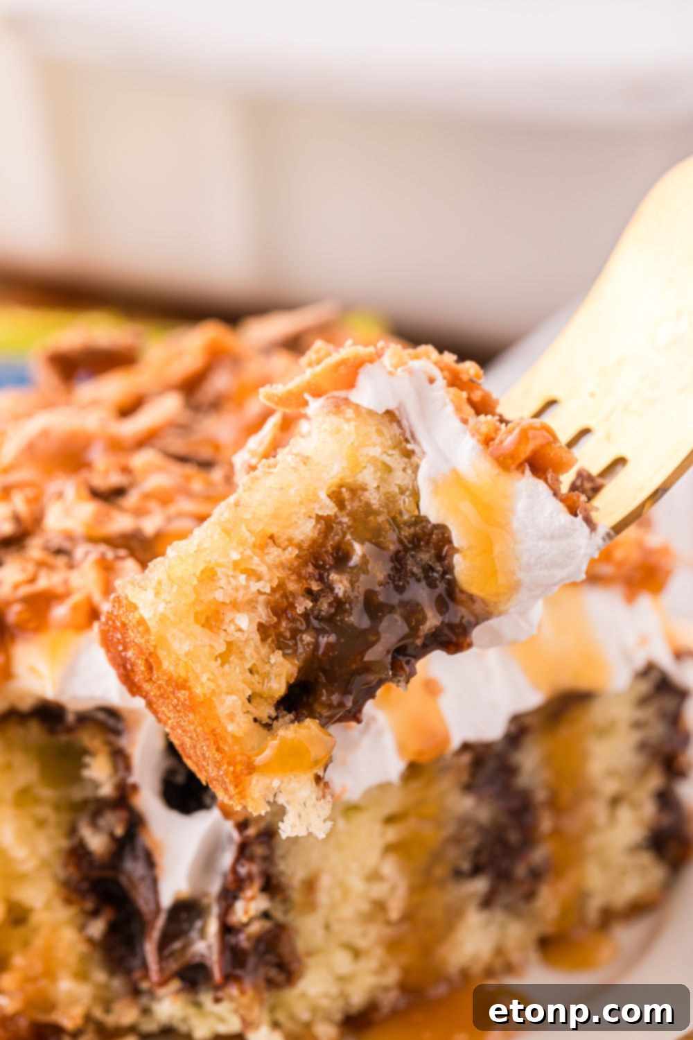 bite with poke cake taken out of it