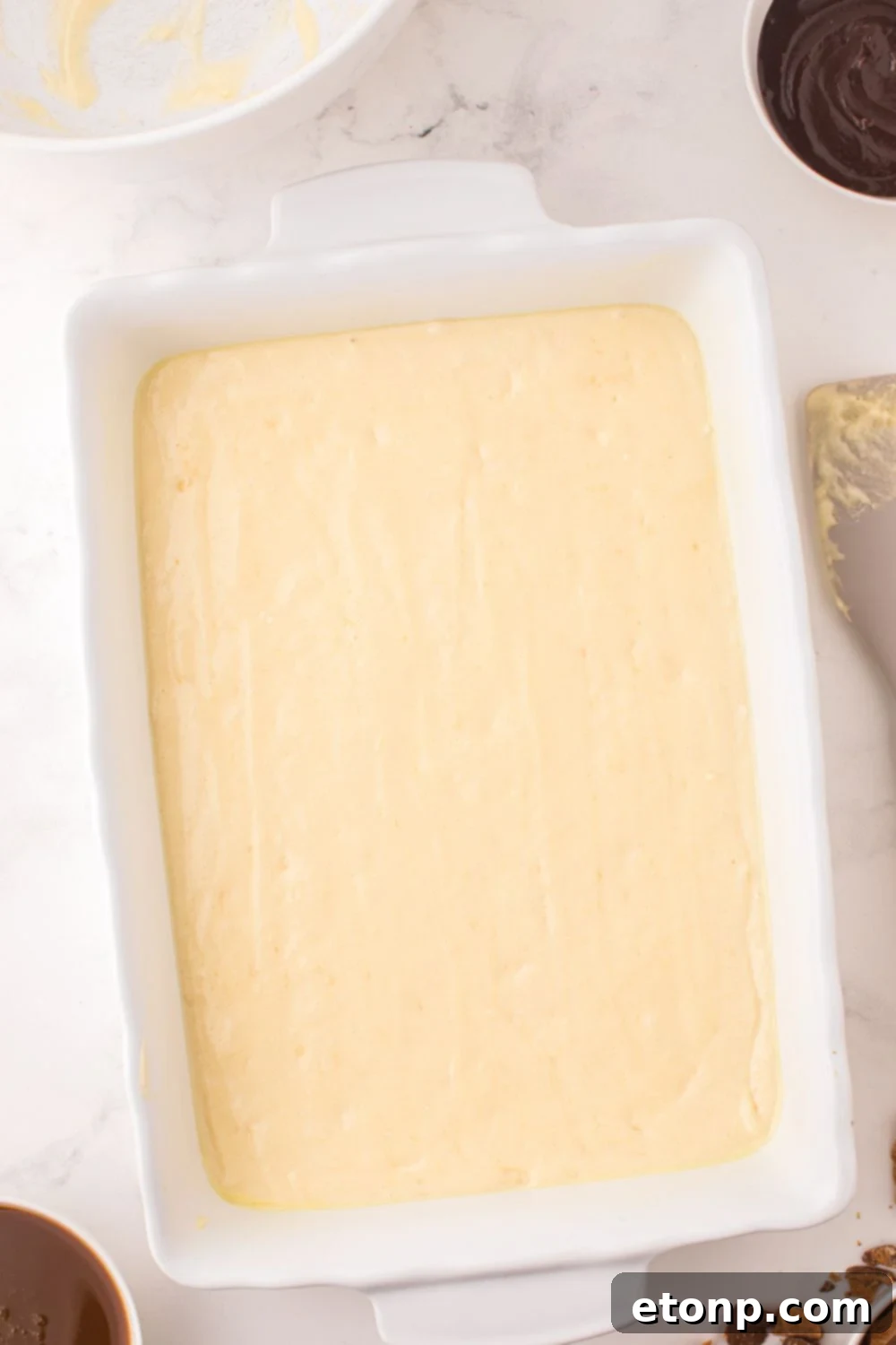 cake batter in a 9x13 pan 