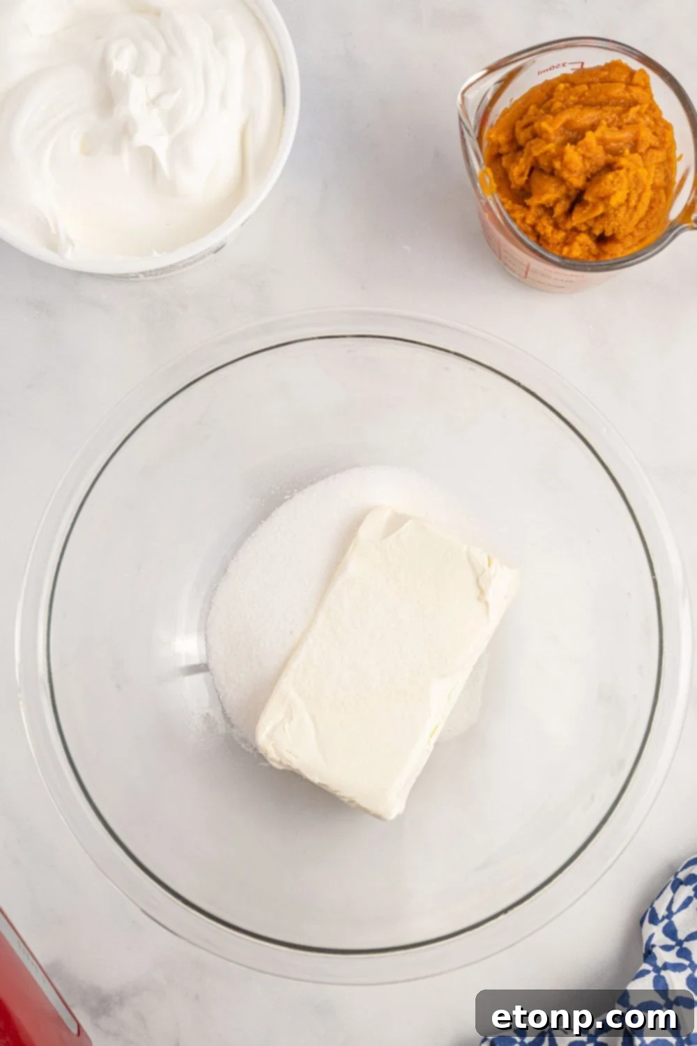 cream cheese in a glass bowl on table