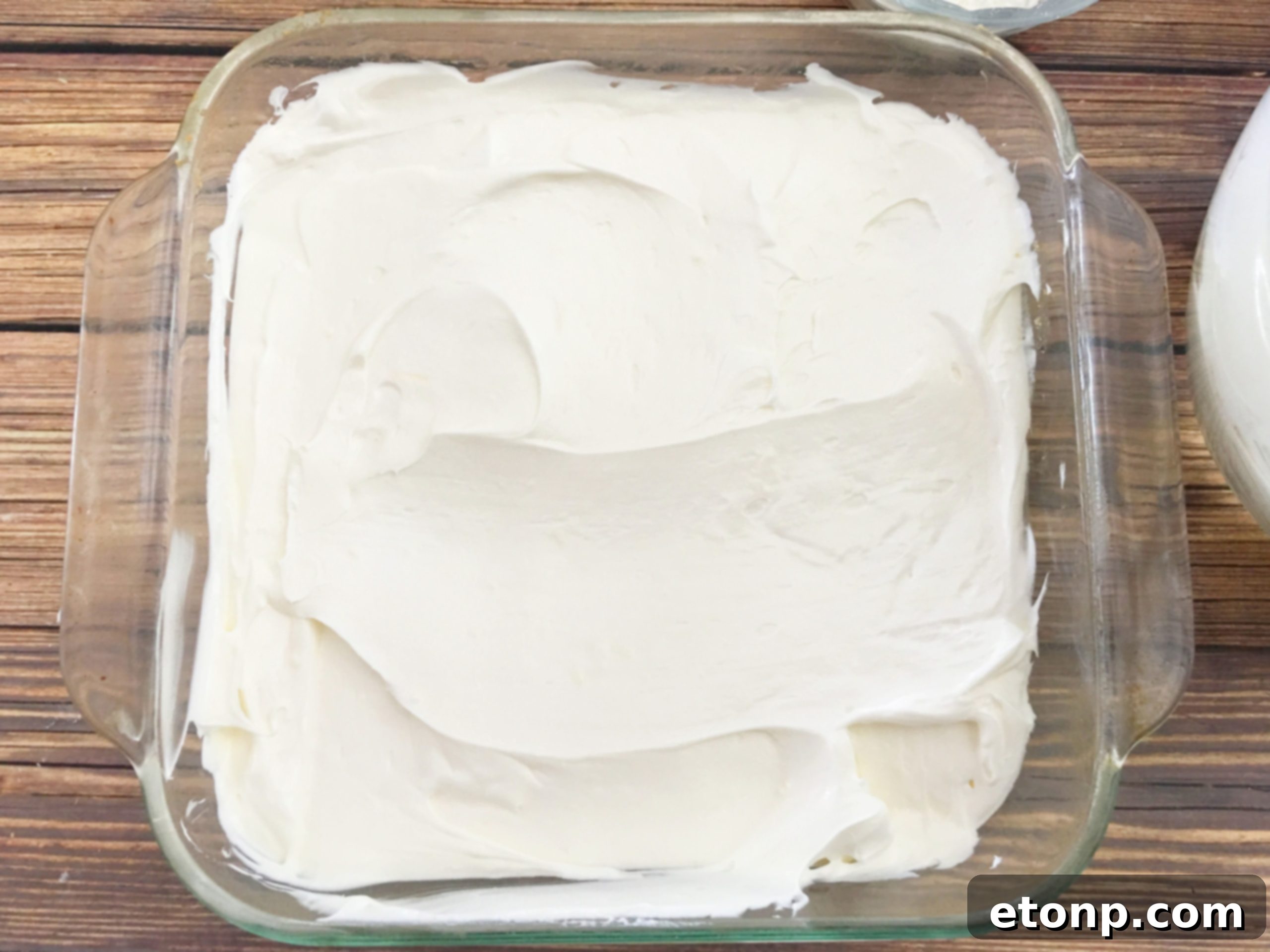 A slice of pumpkin cheesecake lasagna, showcasing its beautiful layers.