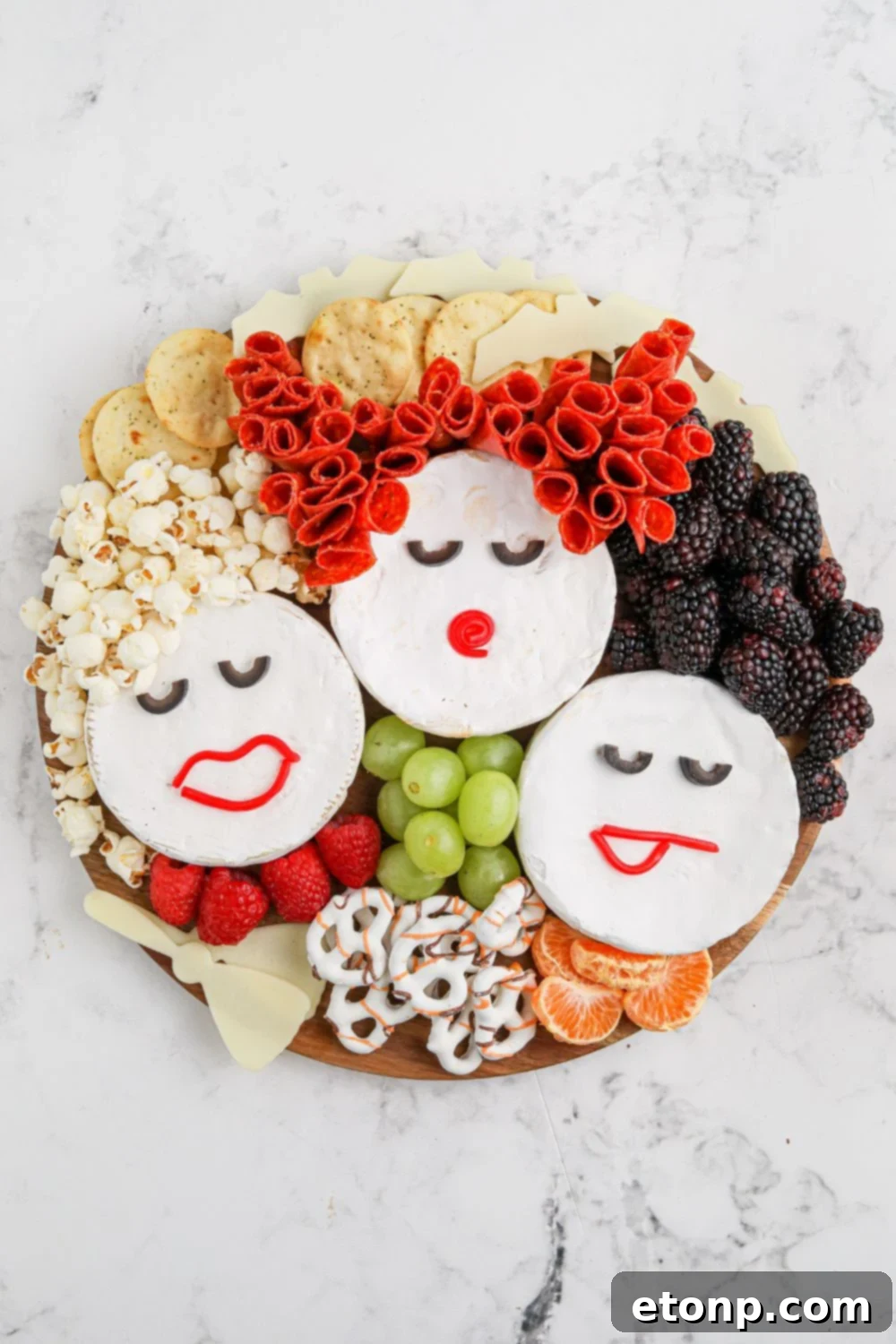 charcuterie board with Sanderson sisters made out of brie cheese