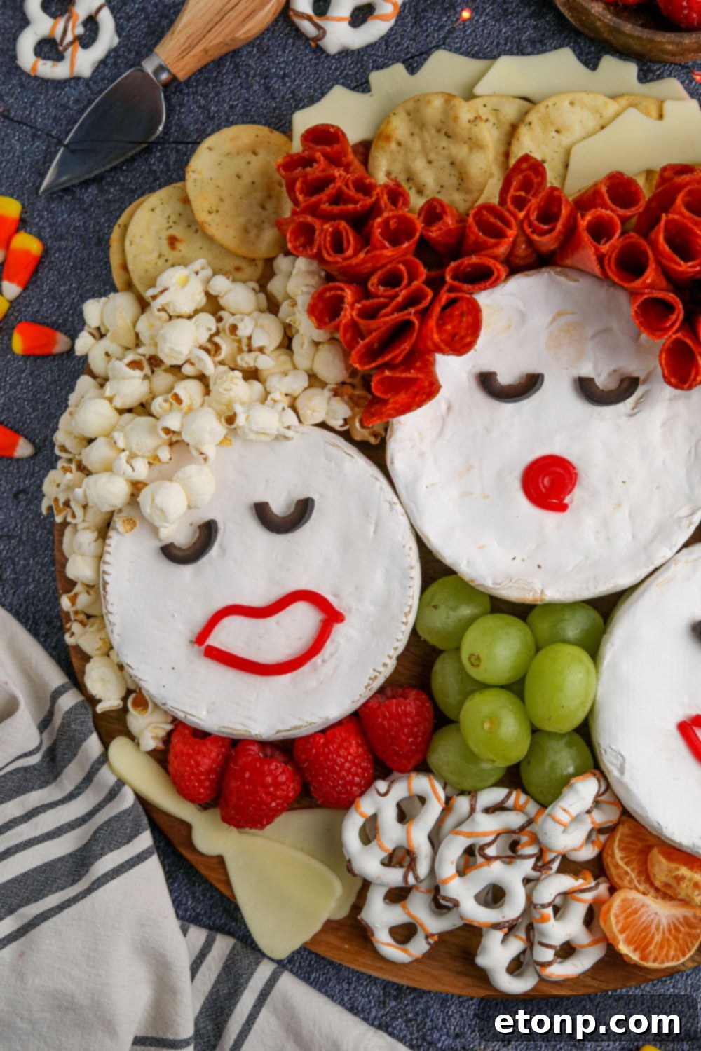 Hocus Pocus Charcuterie Board with snacks around the board