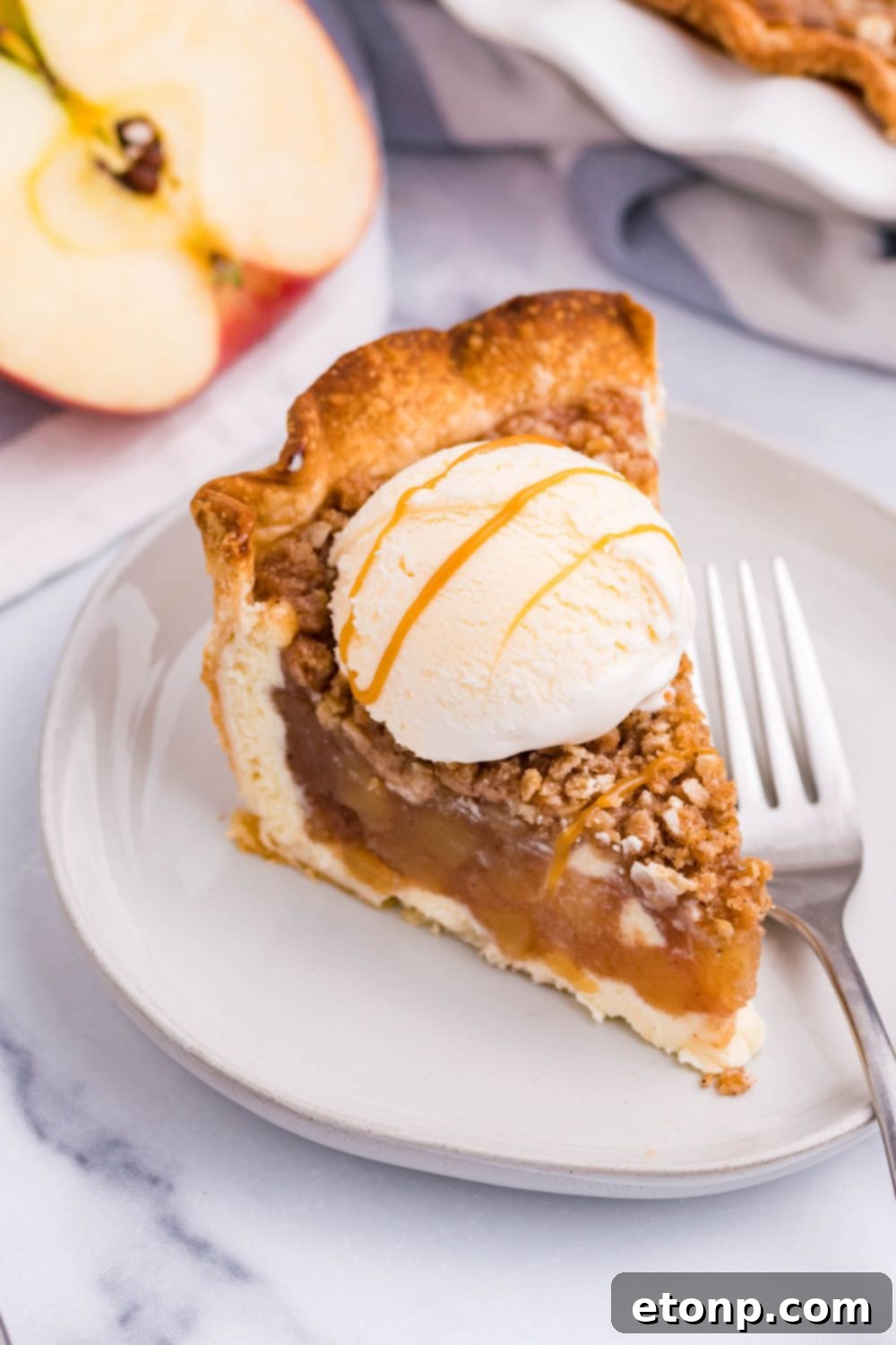 caramel apple crumbl pie on plate