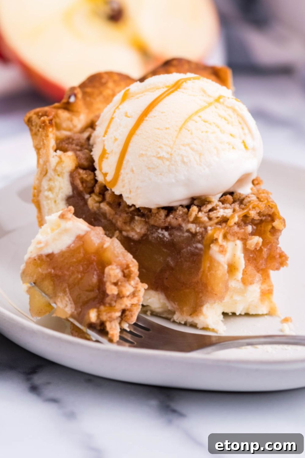 bite taken out of piece of pie on table 