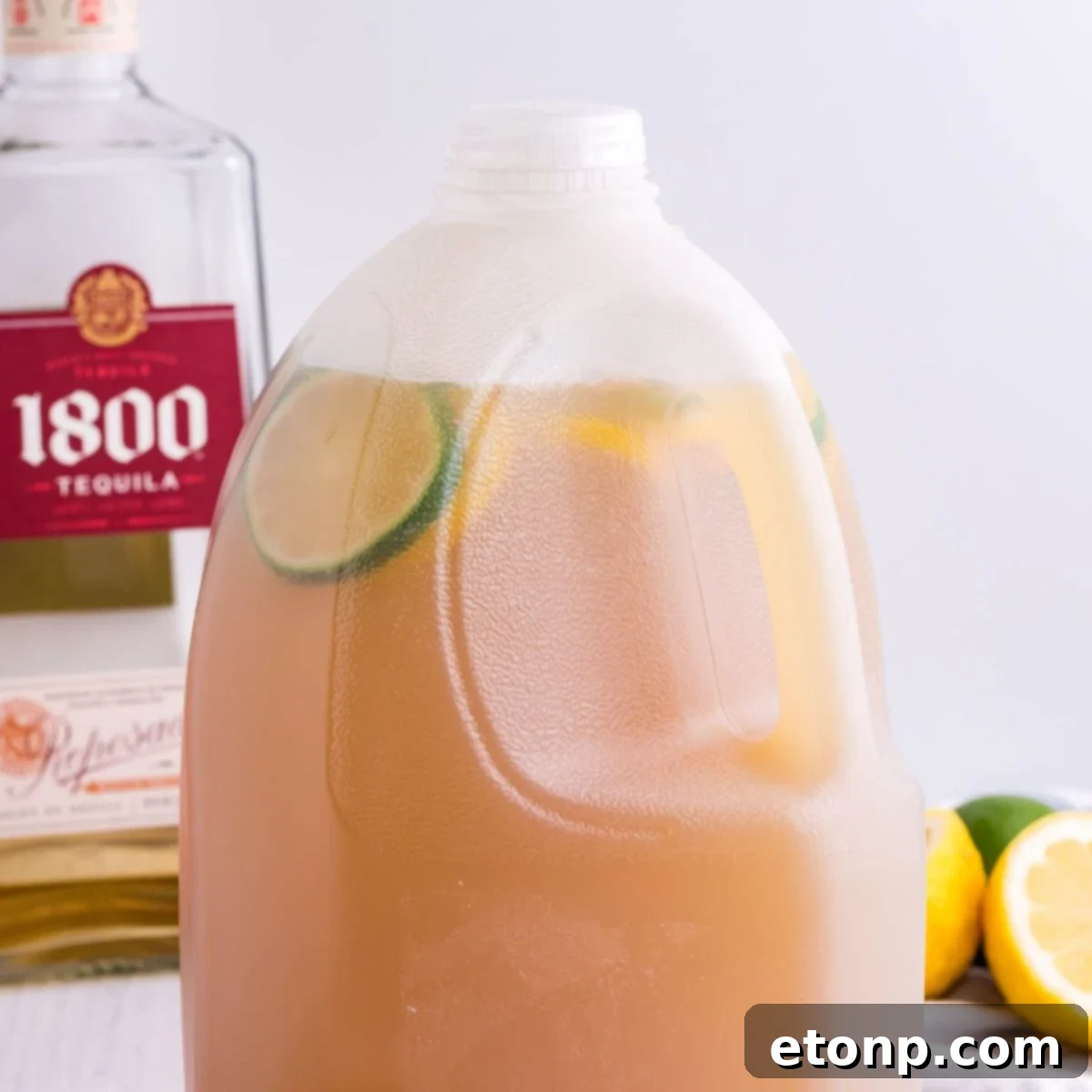 Gallon Margarita mixture inside a repurposed milk jug for easy transport