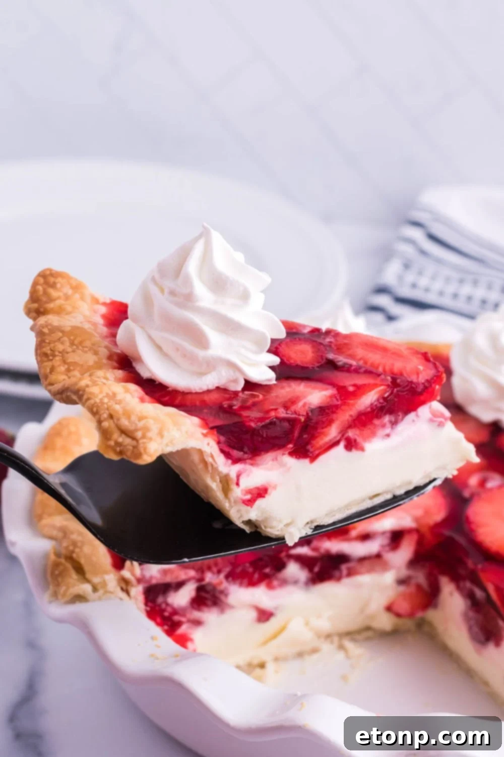 slice of pie above the pie pan