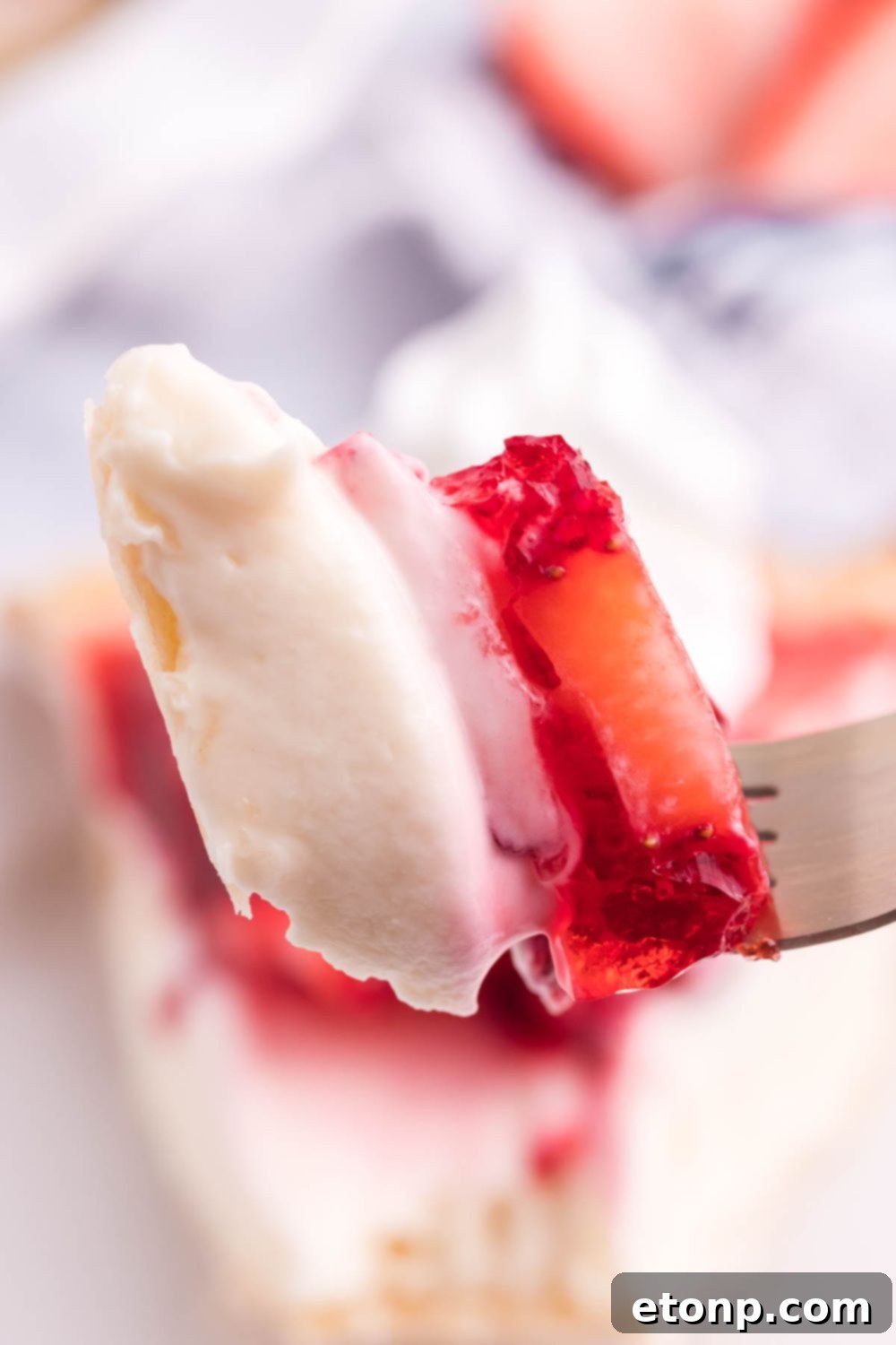 close up view of slice of pie on fork