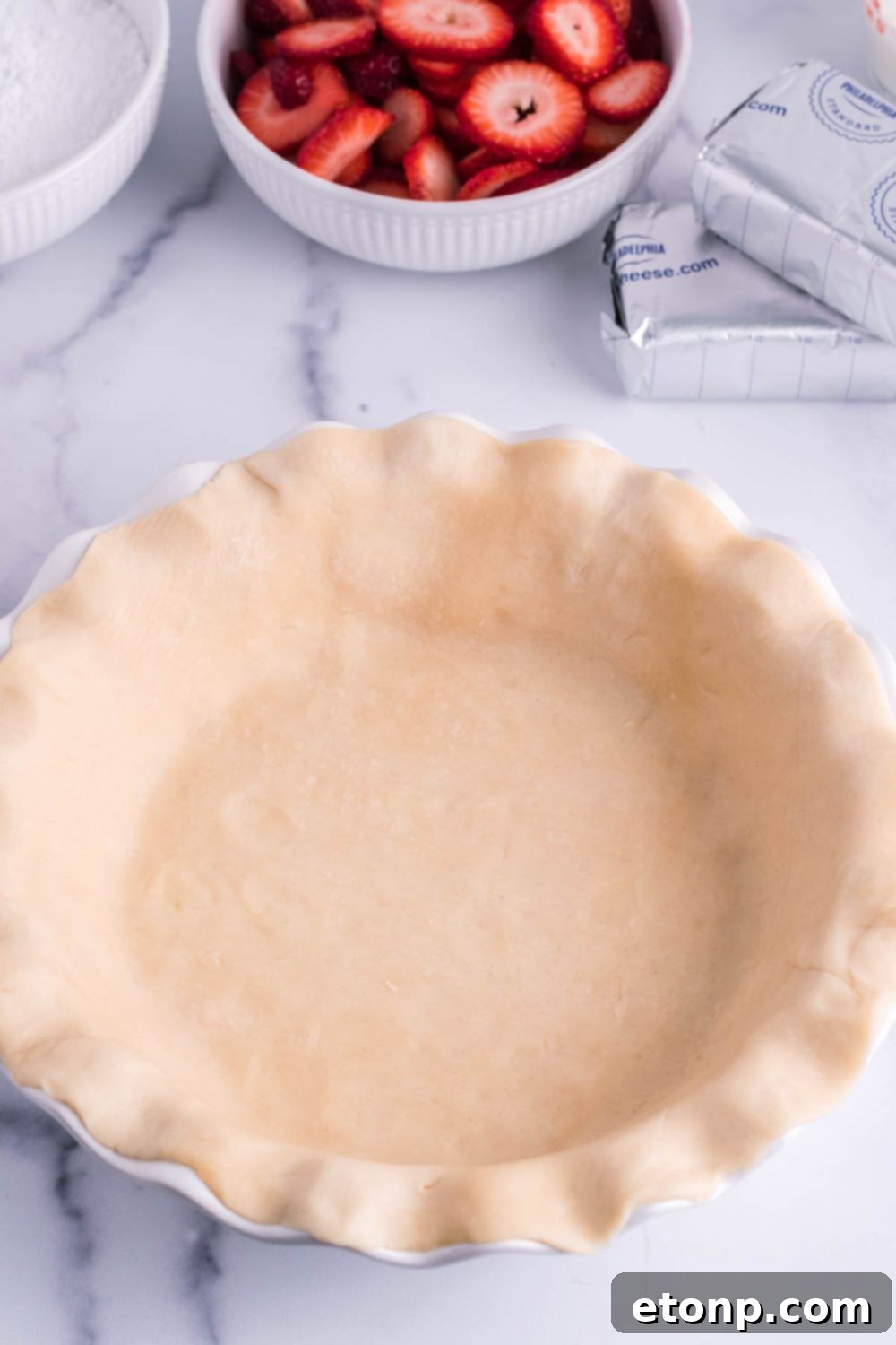 rolled out pie crust in the pie pan 