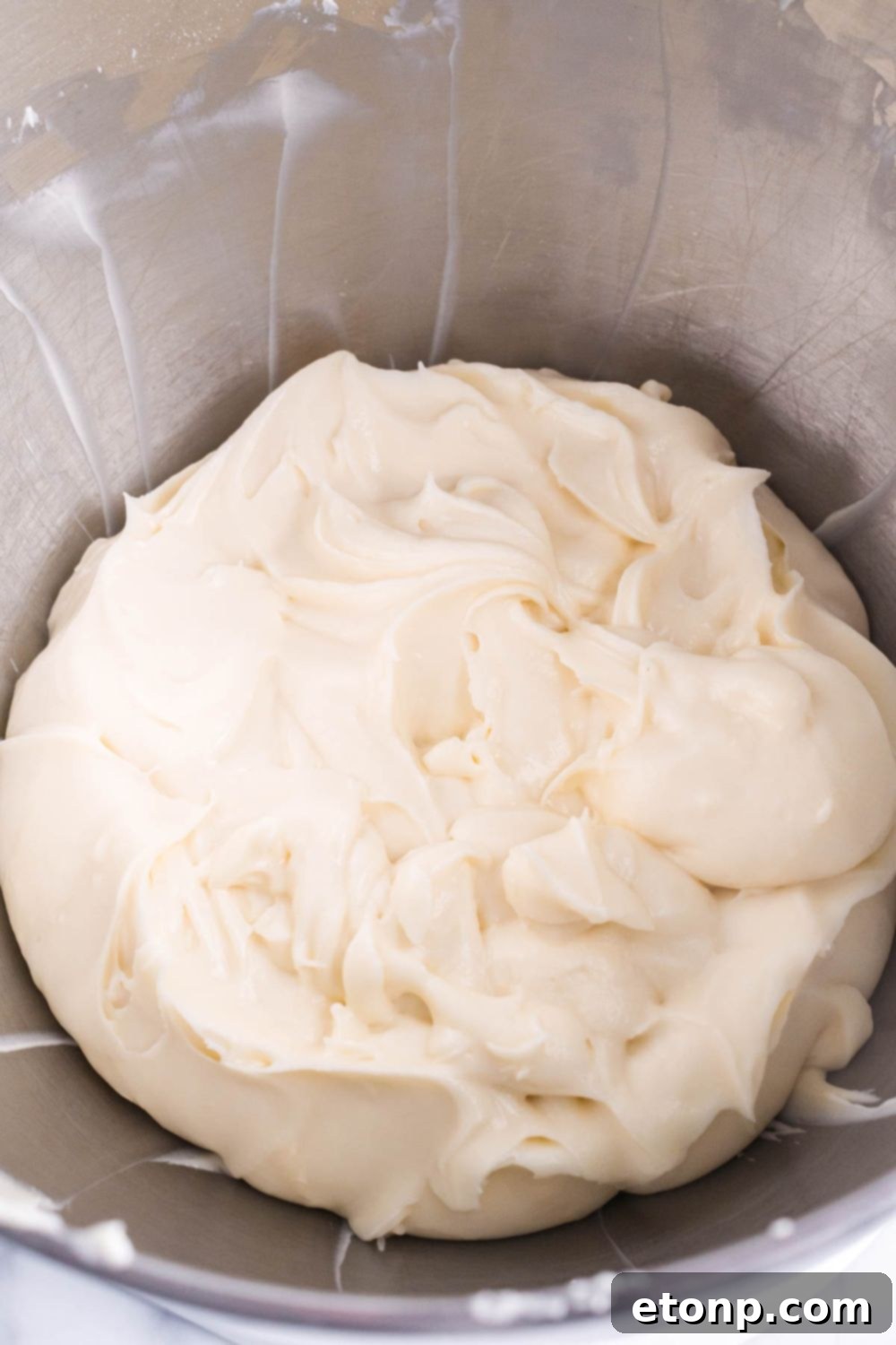 cream cheese mixture in a metal pie