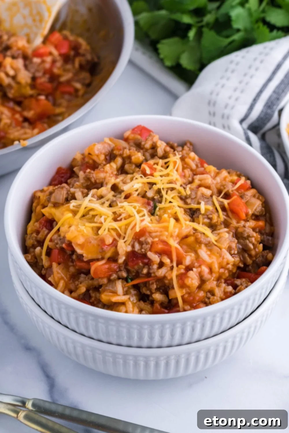 bowls with pepper an rice mixture in it 