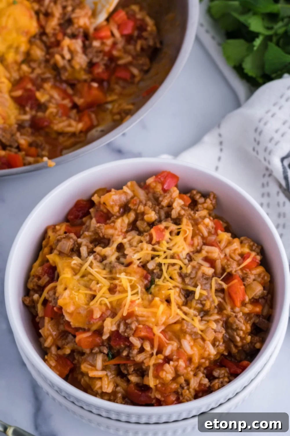 rice casserole in pan and bowl on table 