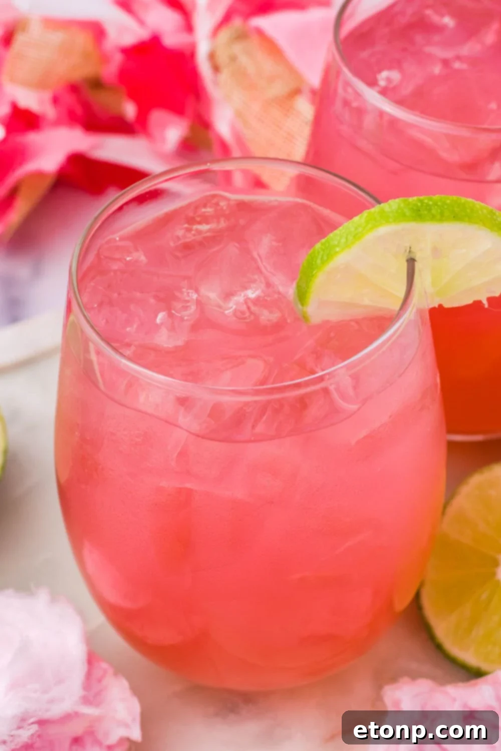 cotton candy margaritas in glasses on table