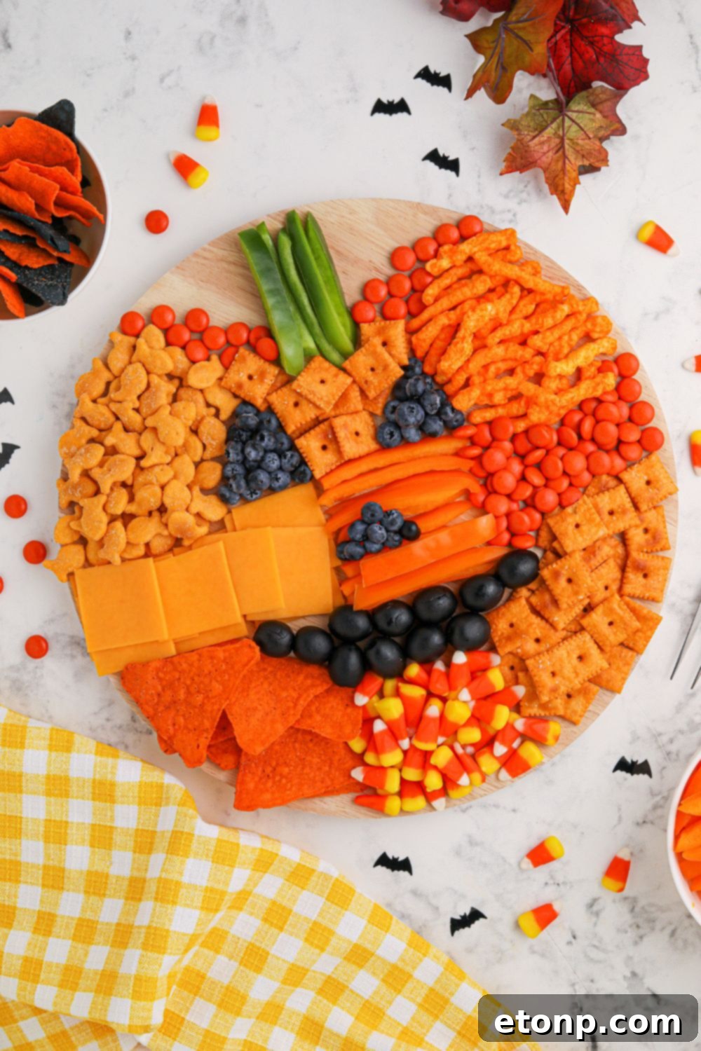 Halloween charcuterie board shown from an overhead, slightly slanted perspective