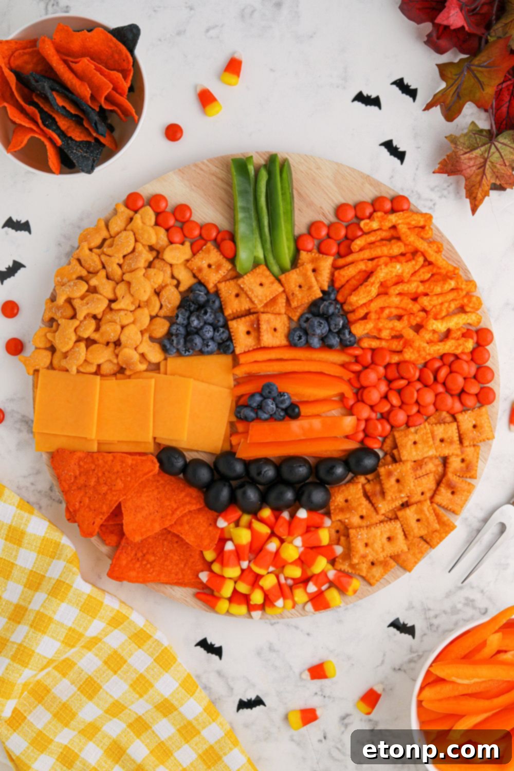 Pumpkin Charcuterie Board emphasizing neat and attractive arrangement of snacks
