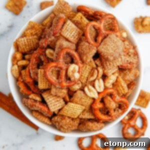 Churro Chex Mix in a bowl on marble counter