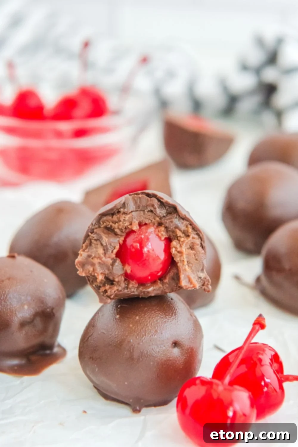 Fudgy Cherry Chocolate Bombs 16 chocolate brownie cherry bombs stacked on table