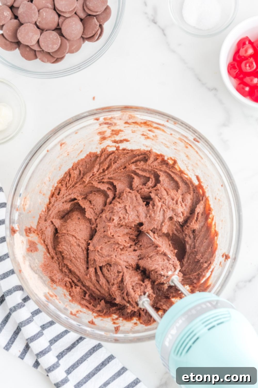 Fudgy Cherry Chocolate Bombs 8 brownie batter in a bowl with mixer in bowl
