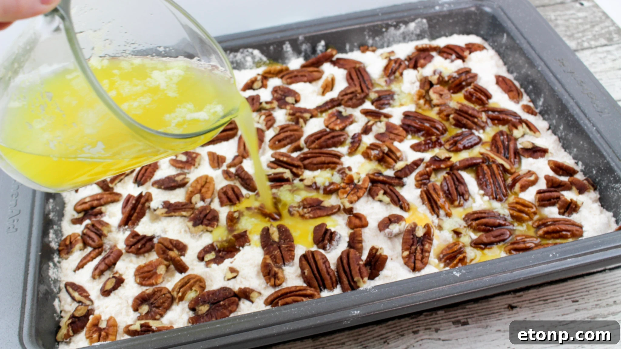 Simply Divine Pumpkin Pecan Dump Cake 9 A larger portion of the Pumpkin Pecan Dump Cake, beautifully golden and ready to be served.