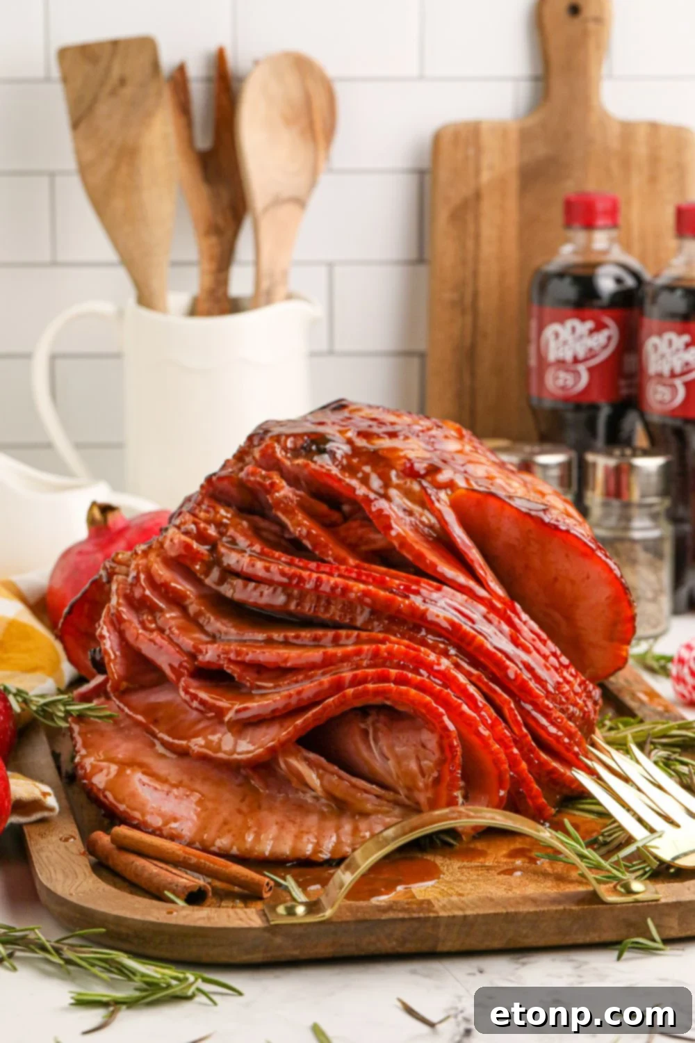 Dr. Pepper Glazed Ham 22 ham on tray with kitchen items behind it