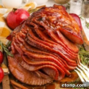 Dr. Pepper Glazed Ham 23 Dr. Pepper Ham on platter with forks beside tray