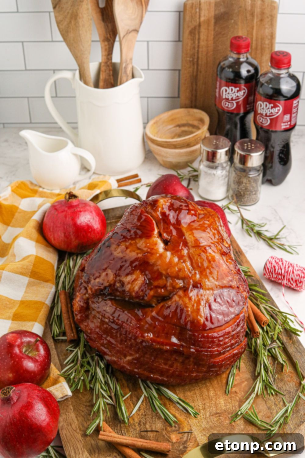 Dr. Pepper Glazed Ham 10 holiday ham on table with items all around it