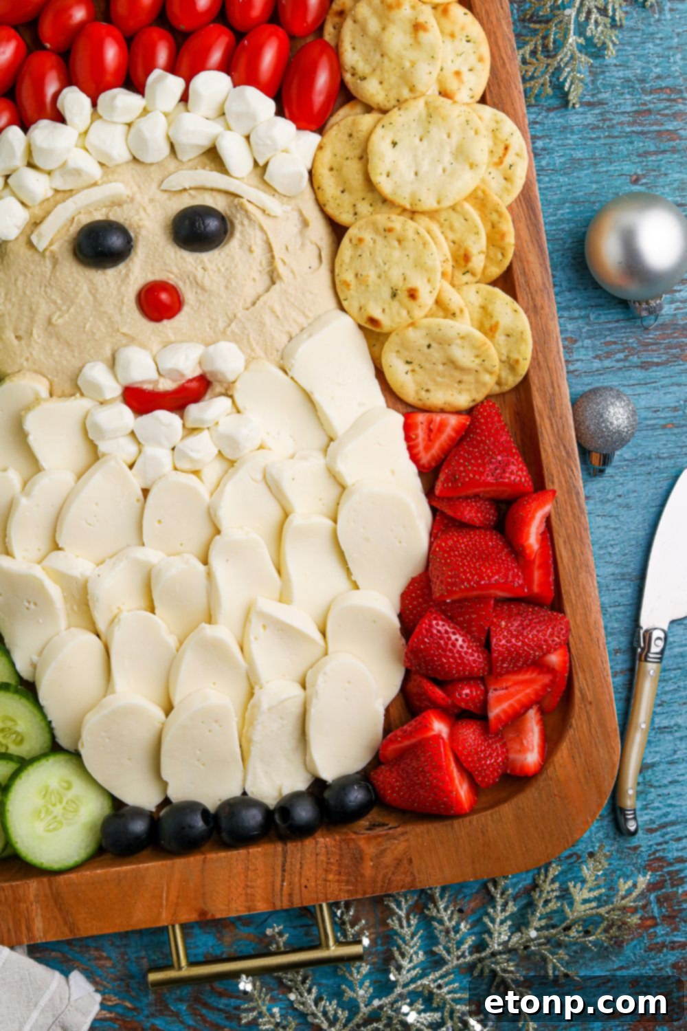 A close-up side view of the Santa Snack Tray, emphasizing the different layers and textures of the snacks.