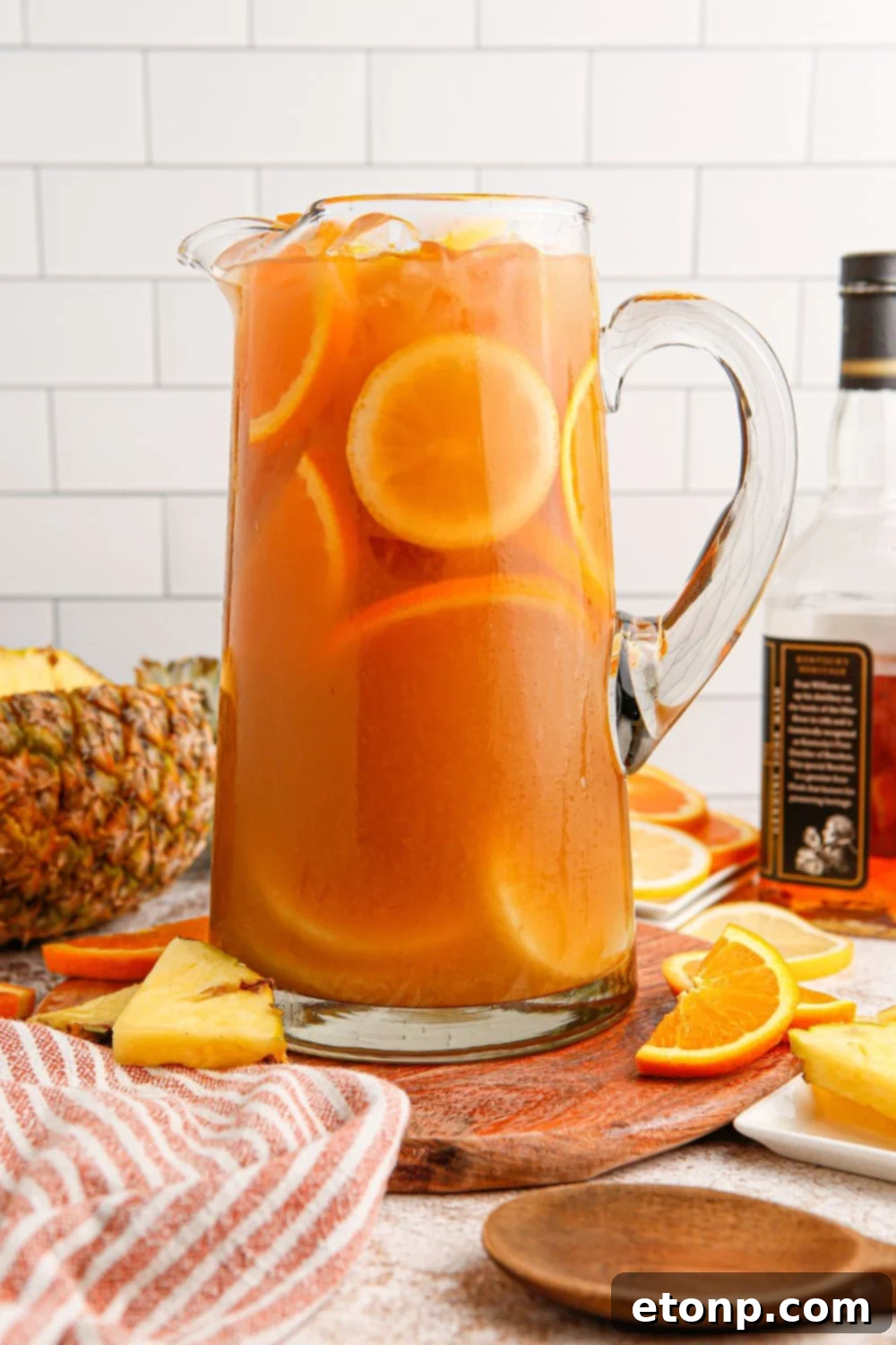 Touchdown Tea in a pitcher with ingredients around it on a table