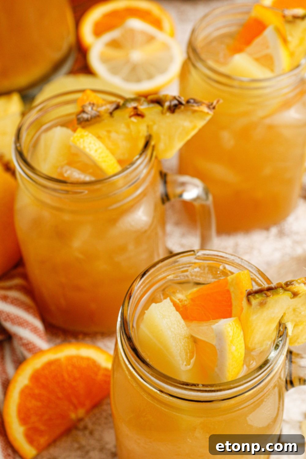 Bourbon and iced tea in glasses on a table, ready to be served