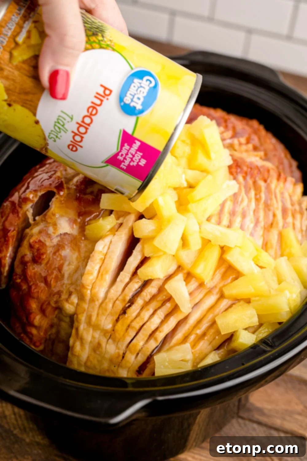 pineapple pouring over ham 