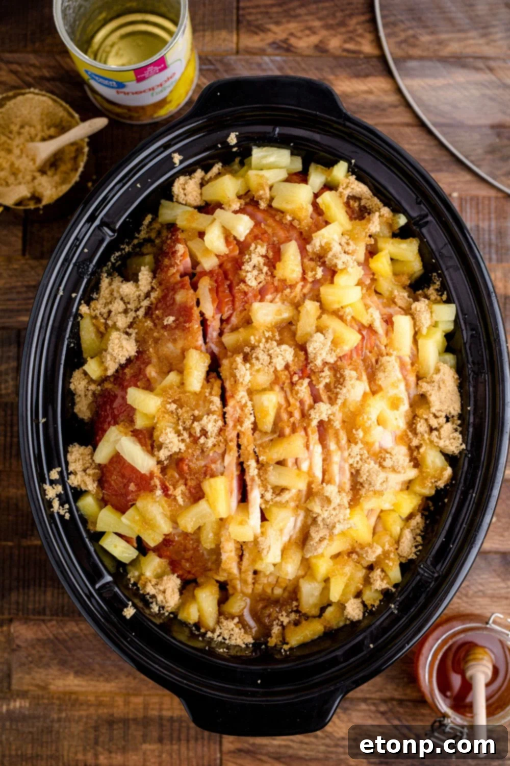 pinepple, brown sugar, ham and honey in a crockpot 