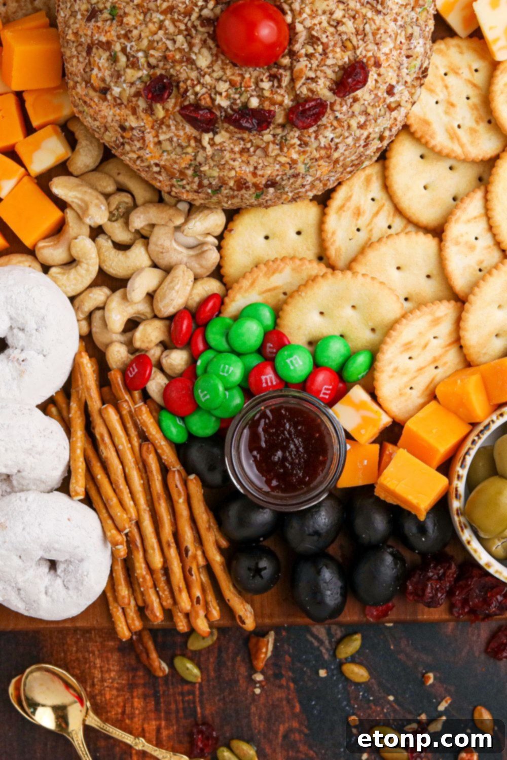 close up of a piece of the cheese and meat board on table 