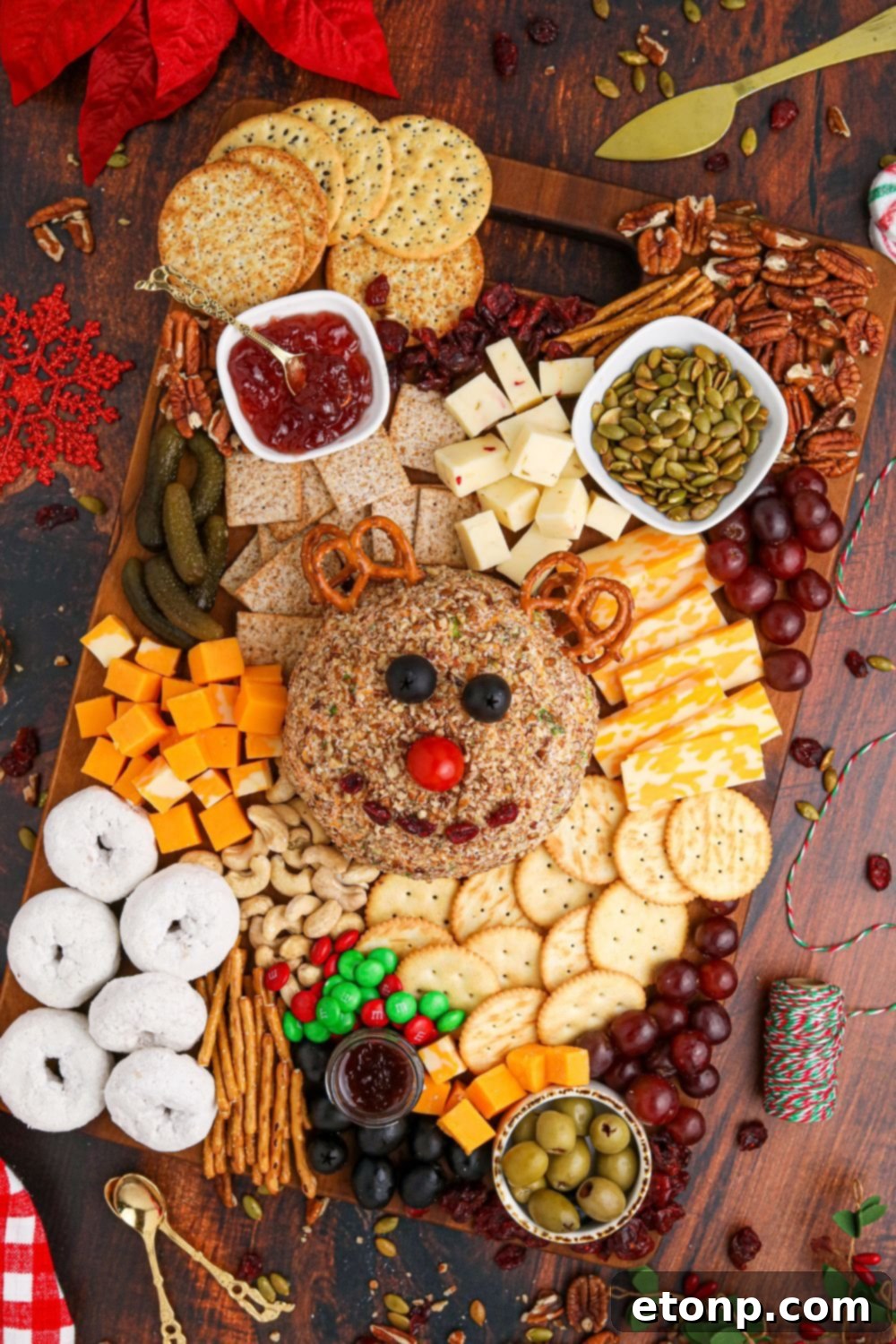 charcuterie board with a cheeseball in the center 