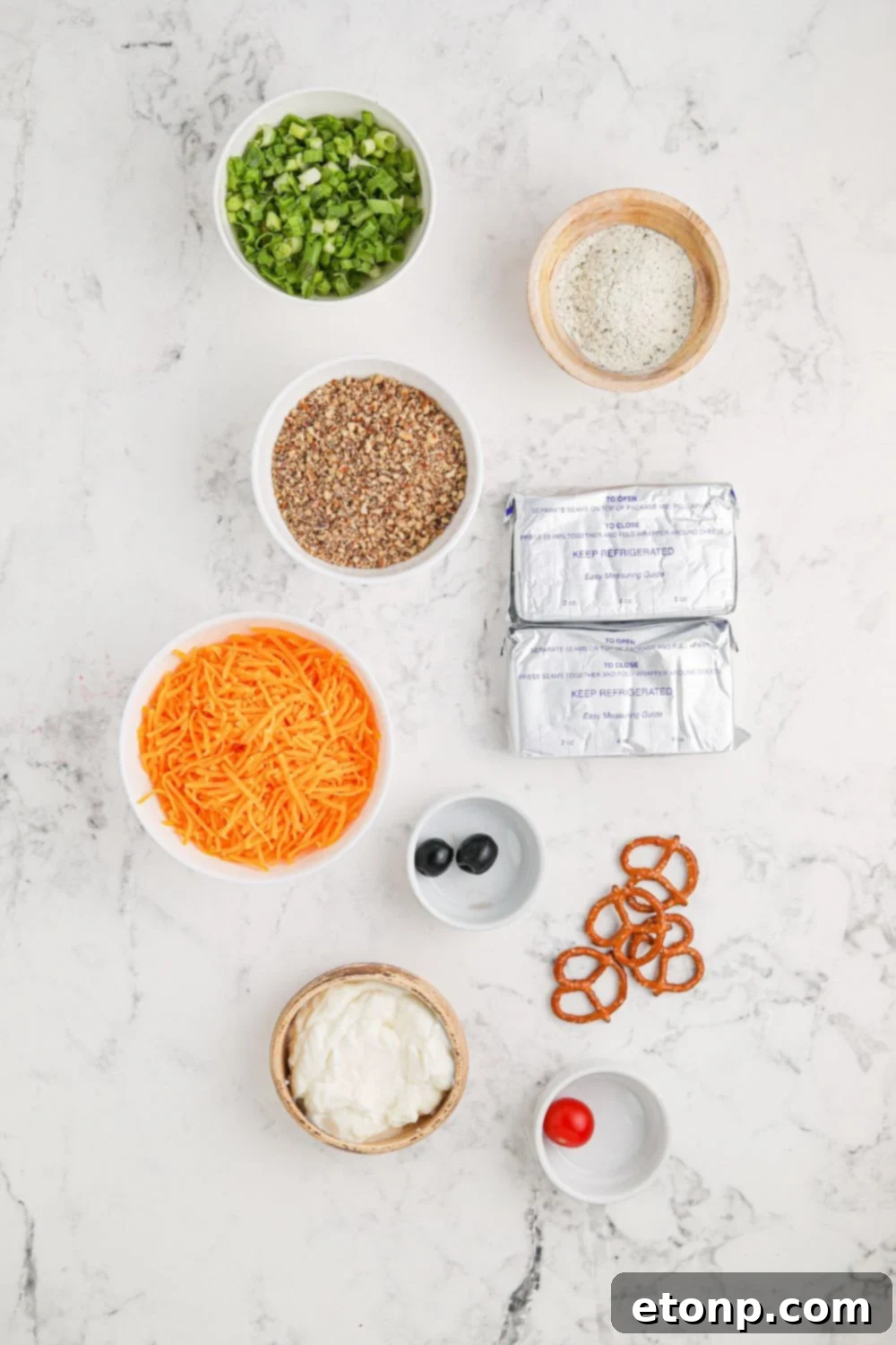 ingredients for cheeseball on table