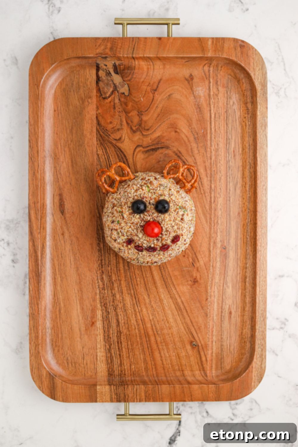 rudolph cheeseball on wooden tray 