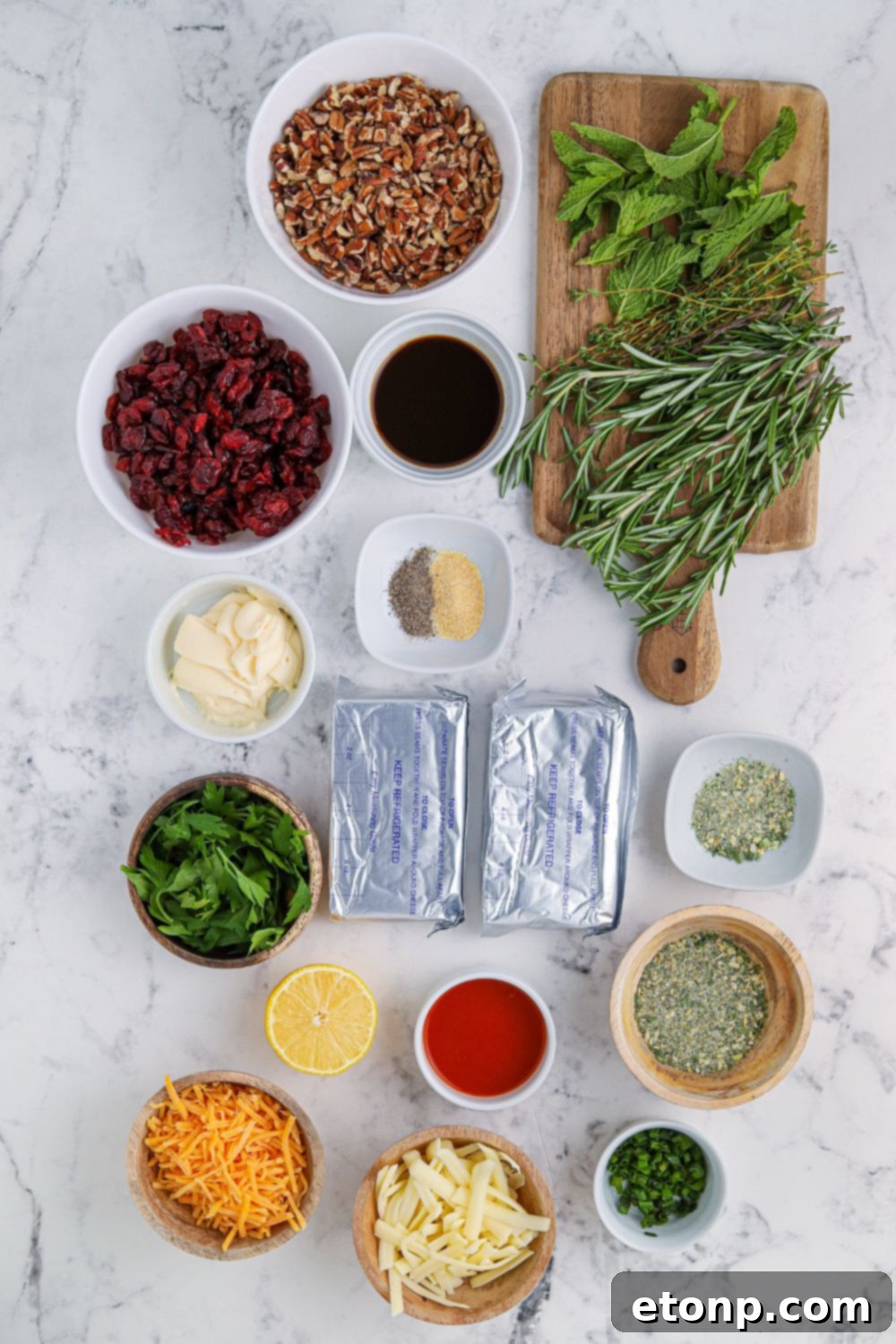 wreath cheese ball ingredients on a marble counter