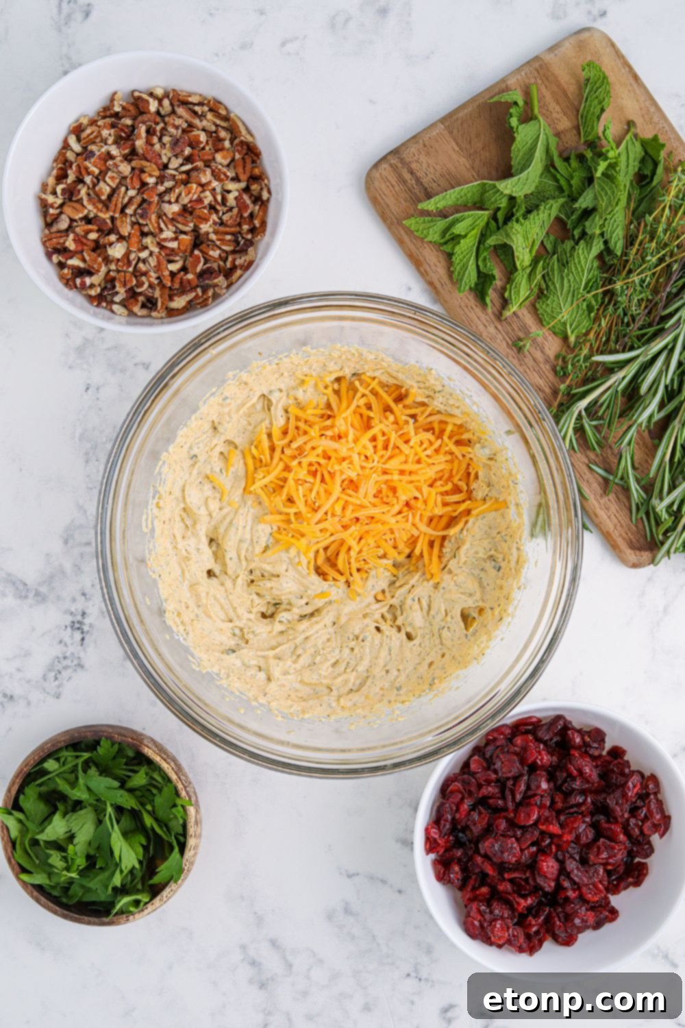ingredients for cheese ball items in a bowl 