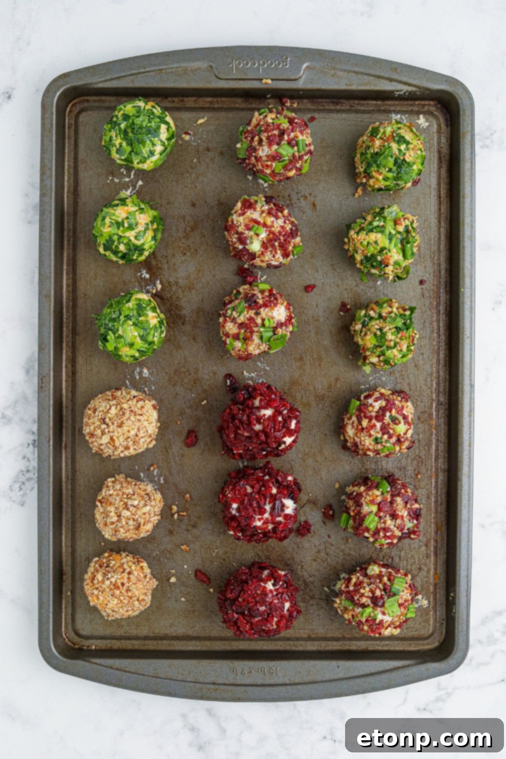cheeseballs on cookie sheet 