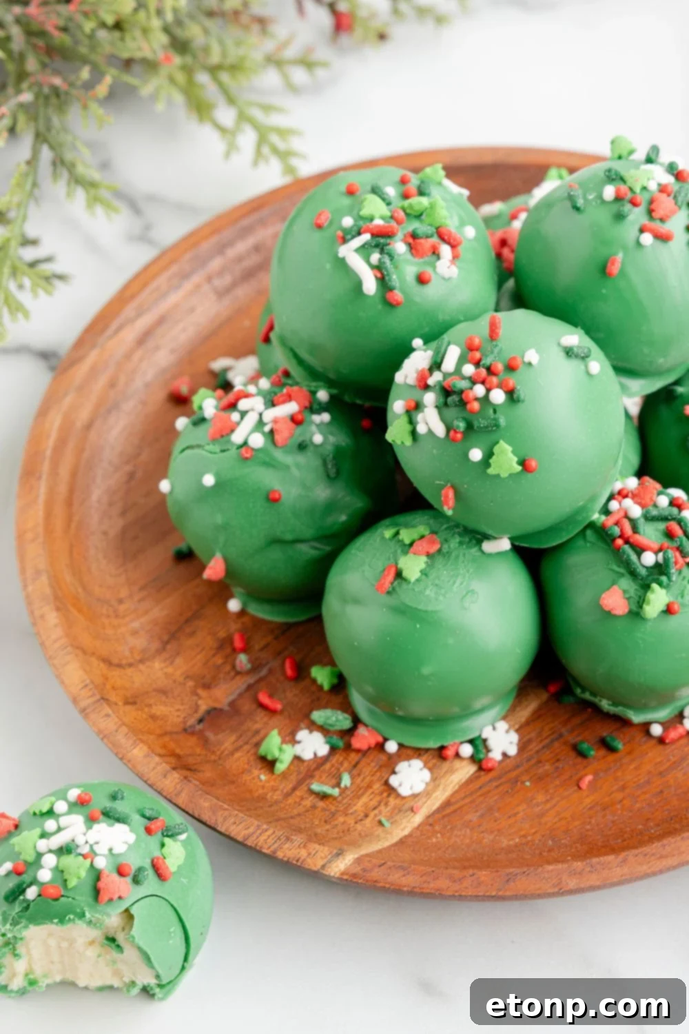 cookie truffles on a wooden plate