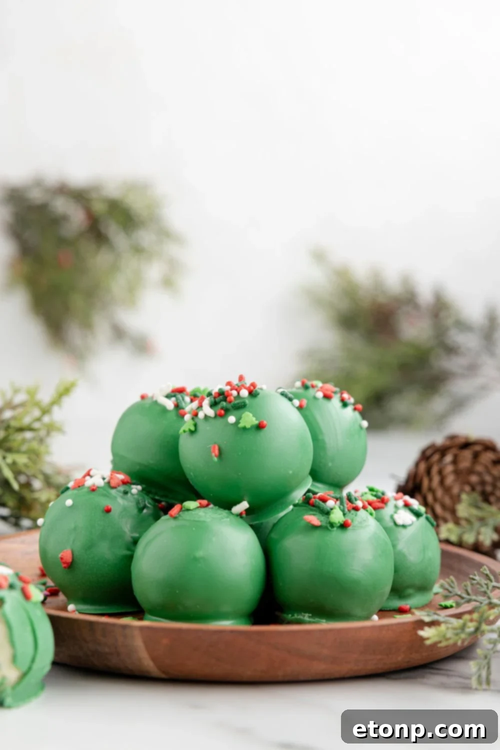 sugar cookie balls on a wooden table 