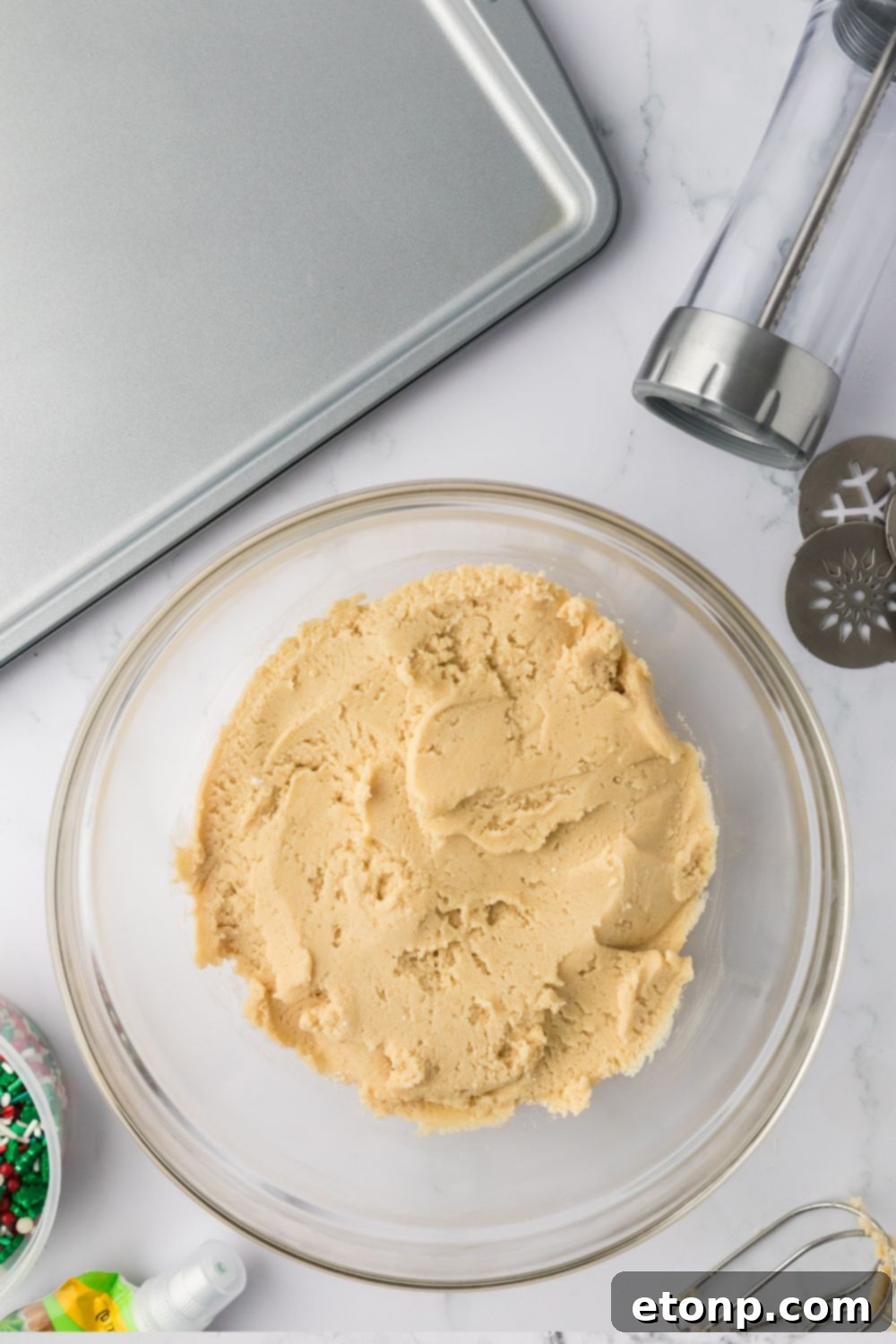 cookie dough in a glass bowl on table