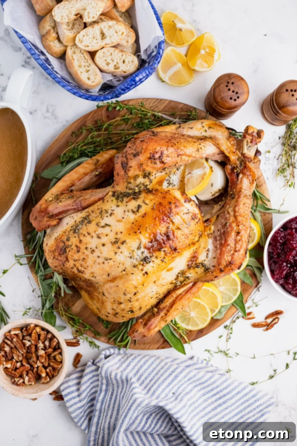 turkey on a platter with garnishes around it