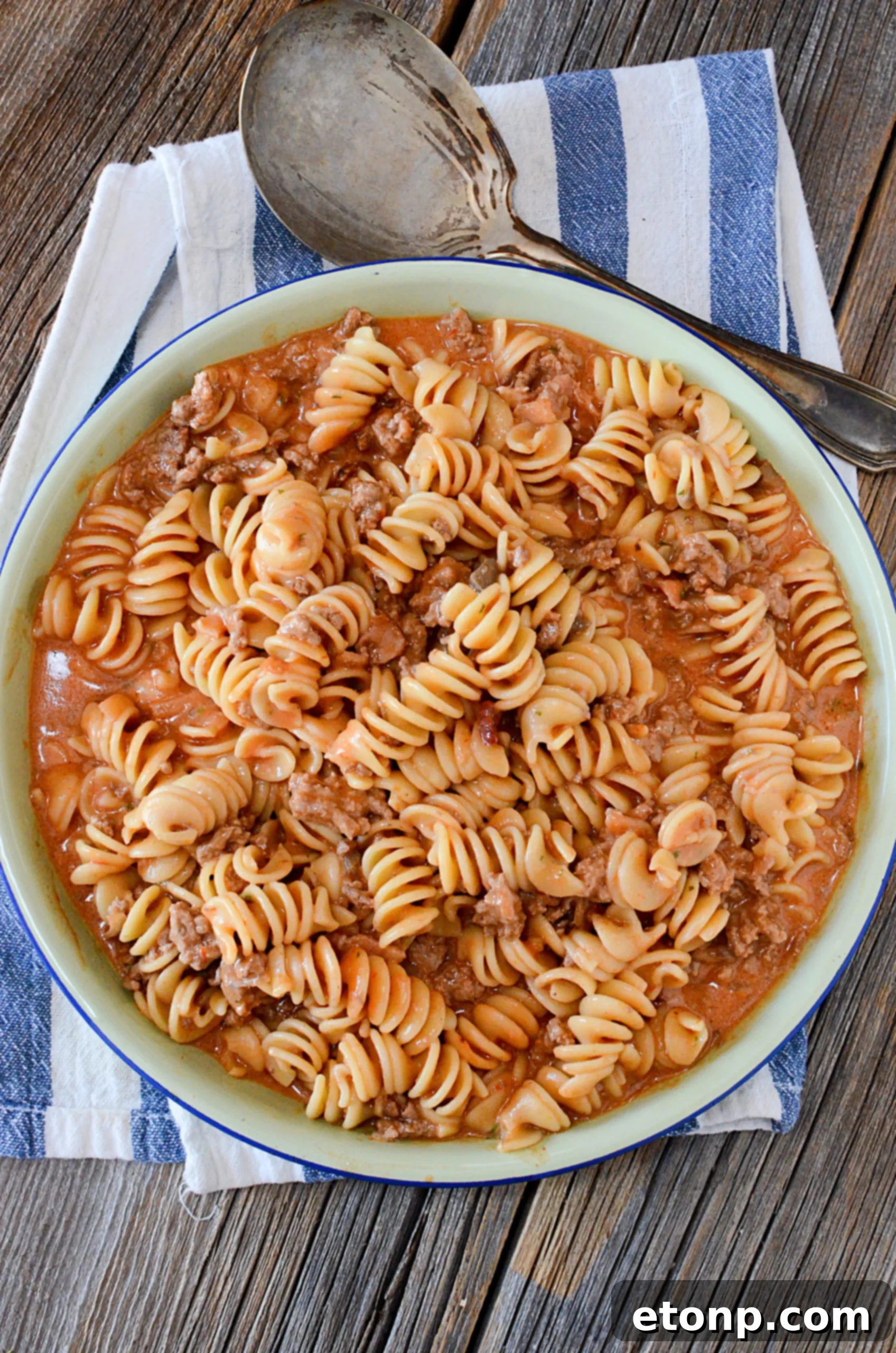 Amish Country Casserole served in a dish with a spoon