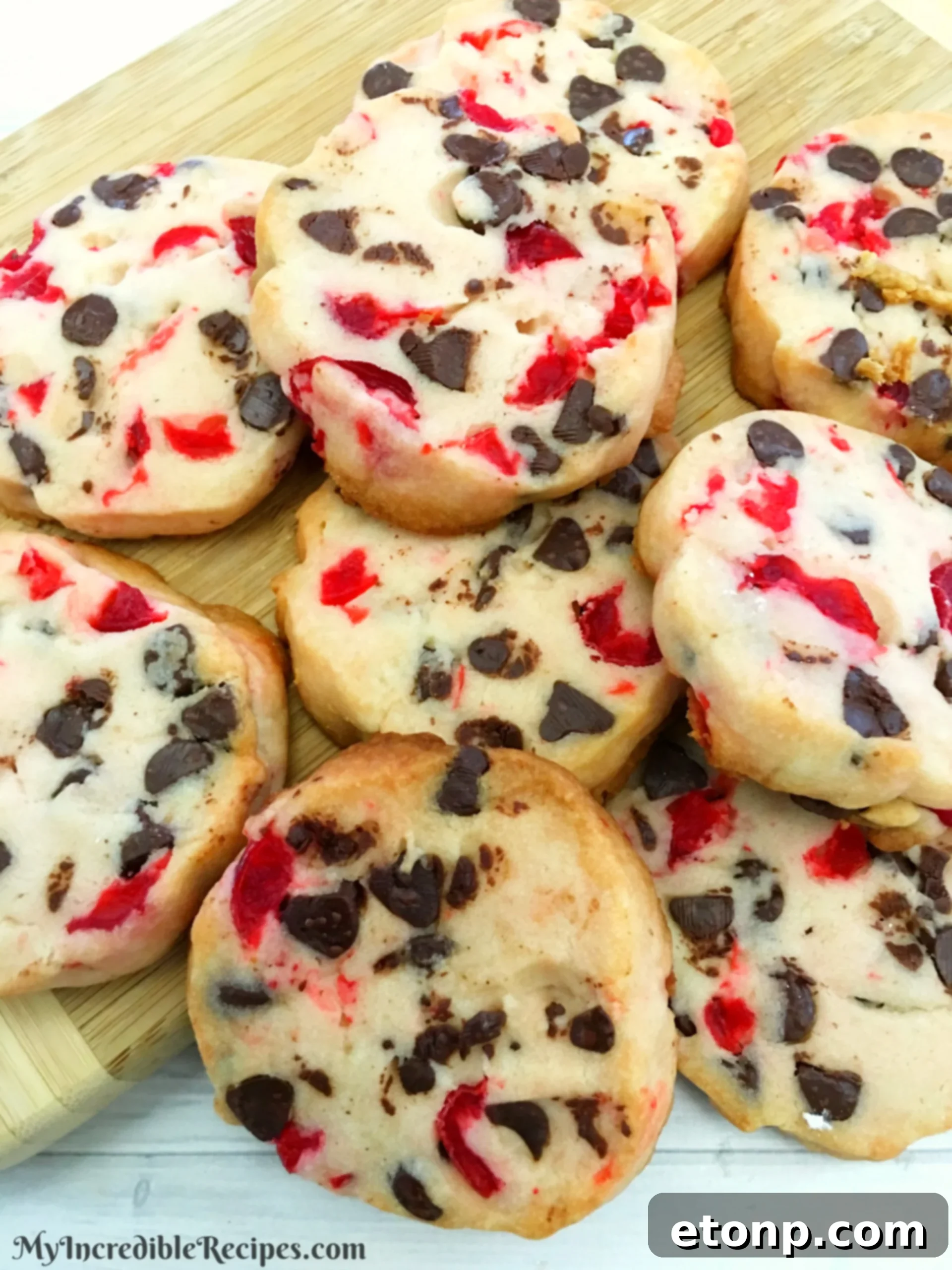 Buttery Maraschino Cherry Christmas Shortbread 11 A festive close-up of a stack of Maraschino Cherry Shortbread Christmas Cookies, ready for gifting or serving.
