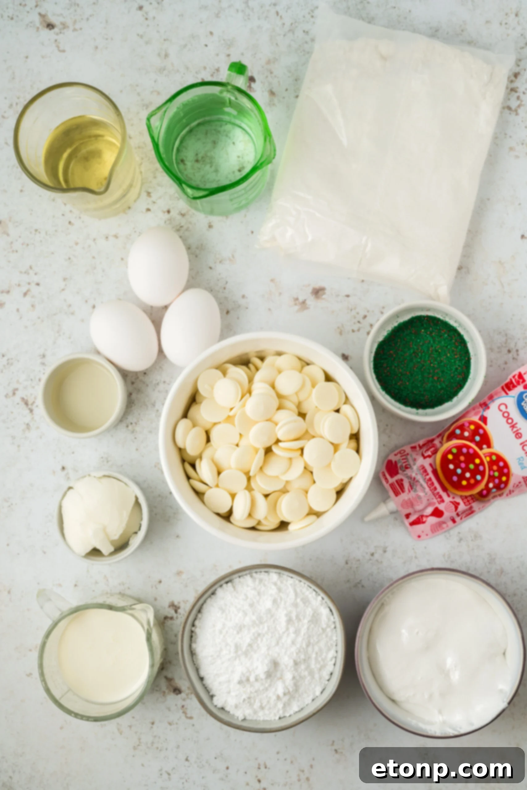 ingredients for christmas tree cakes on table