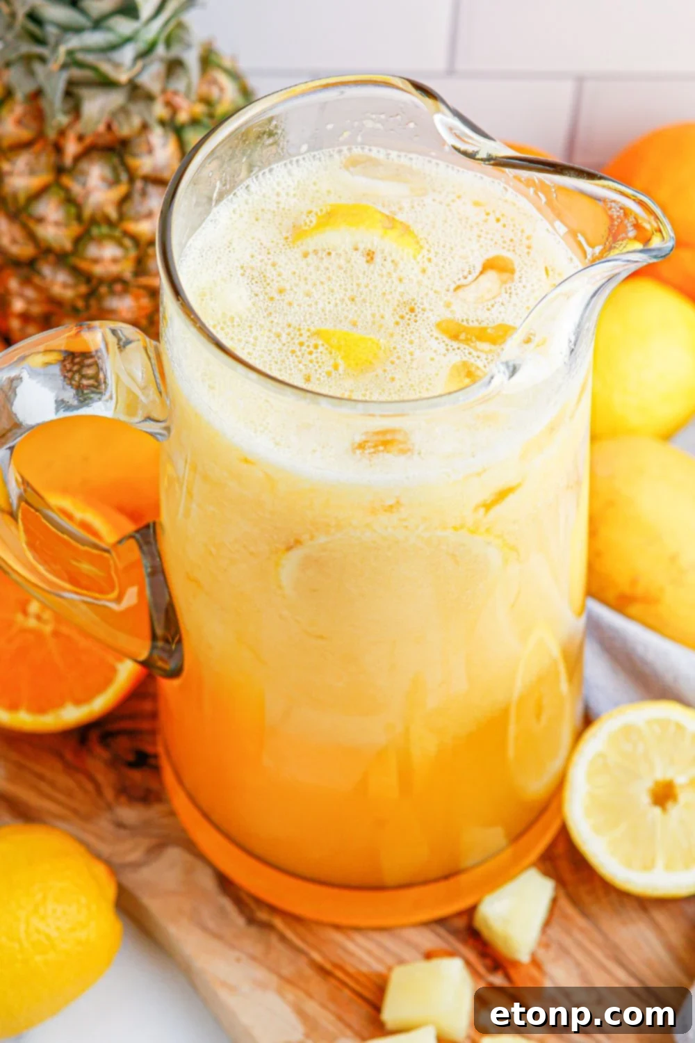 tropical fruit punch in a pitcher on table
