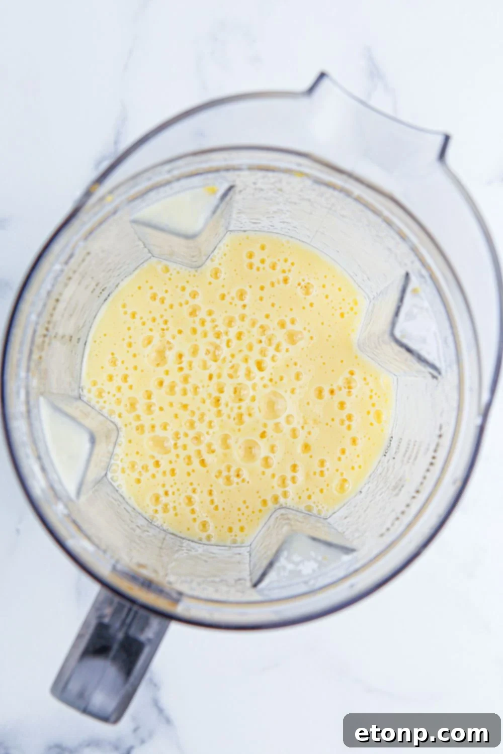 food processor with ingredients blended