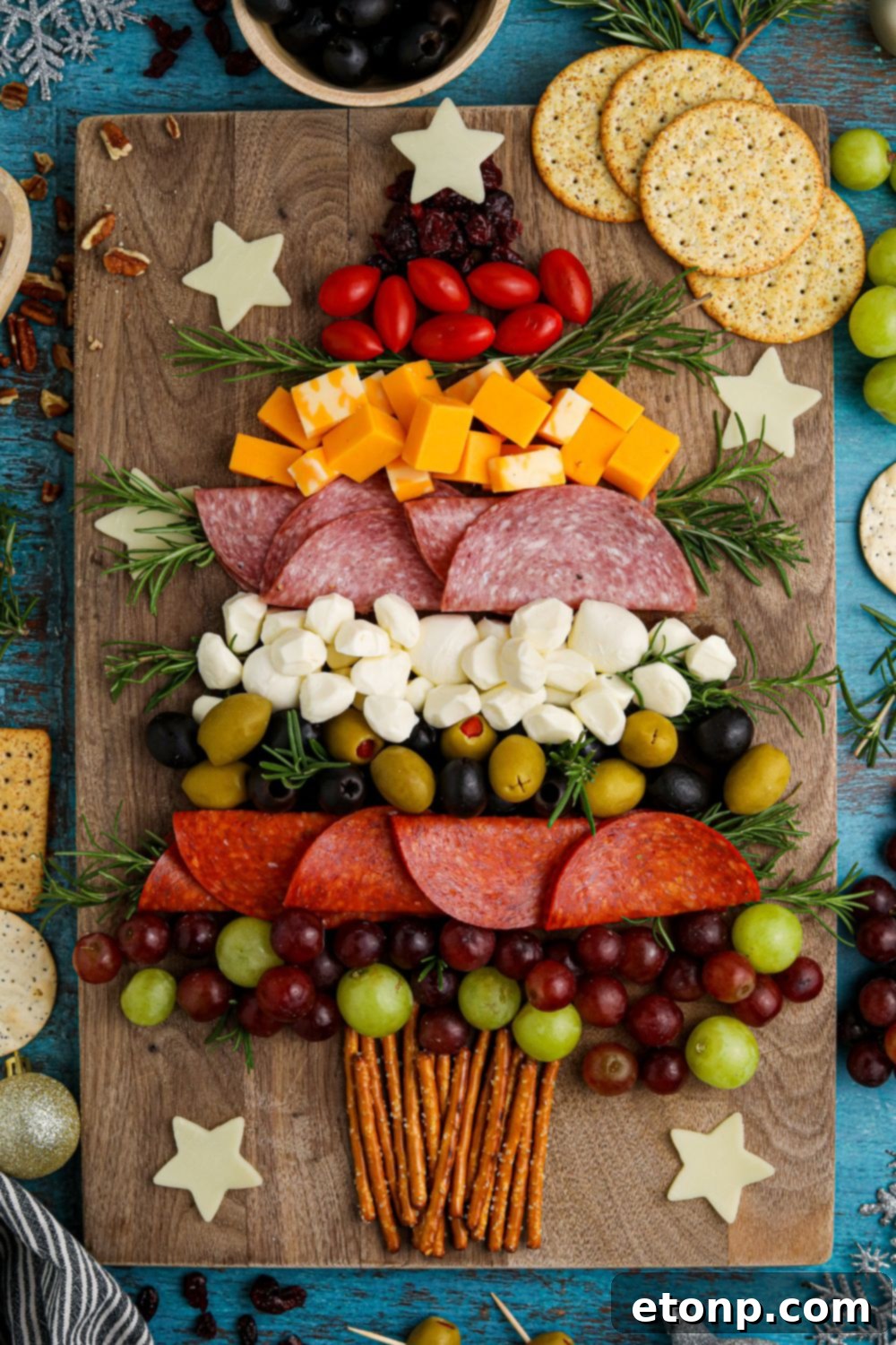 Charcuterie board in a Christmas tree shape, overhead view