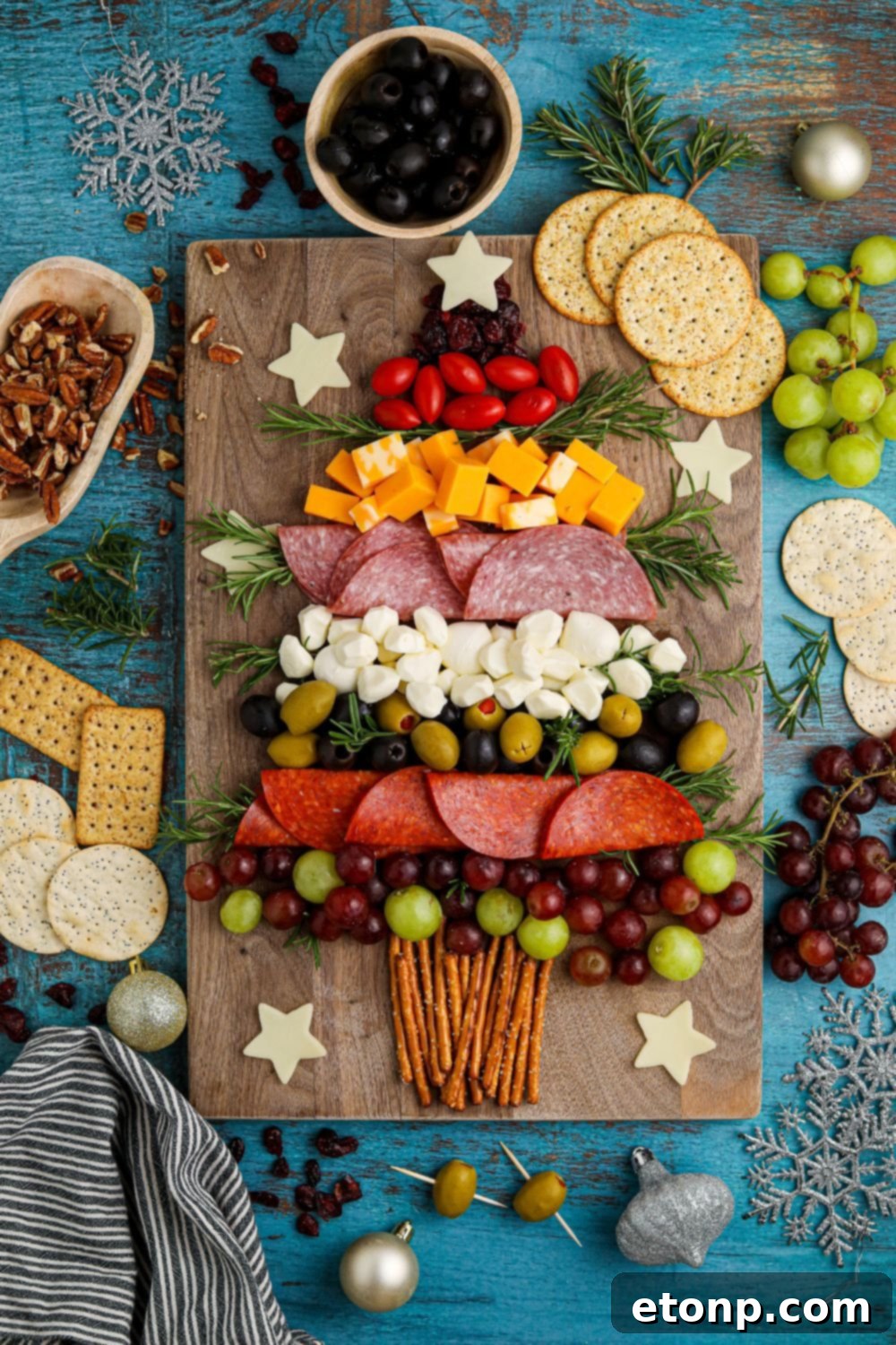Christmas Tree Charcuterie Board on a tray with festive decorations