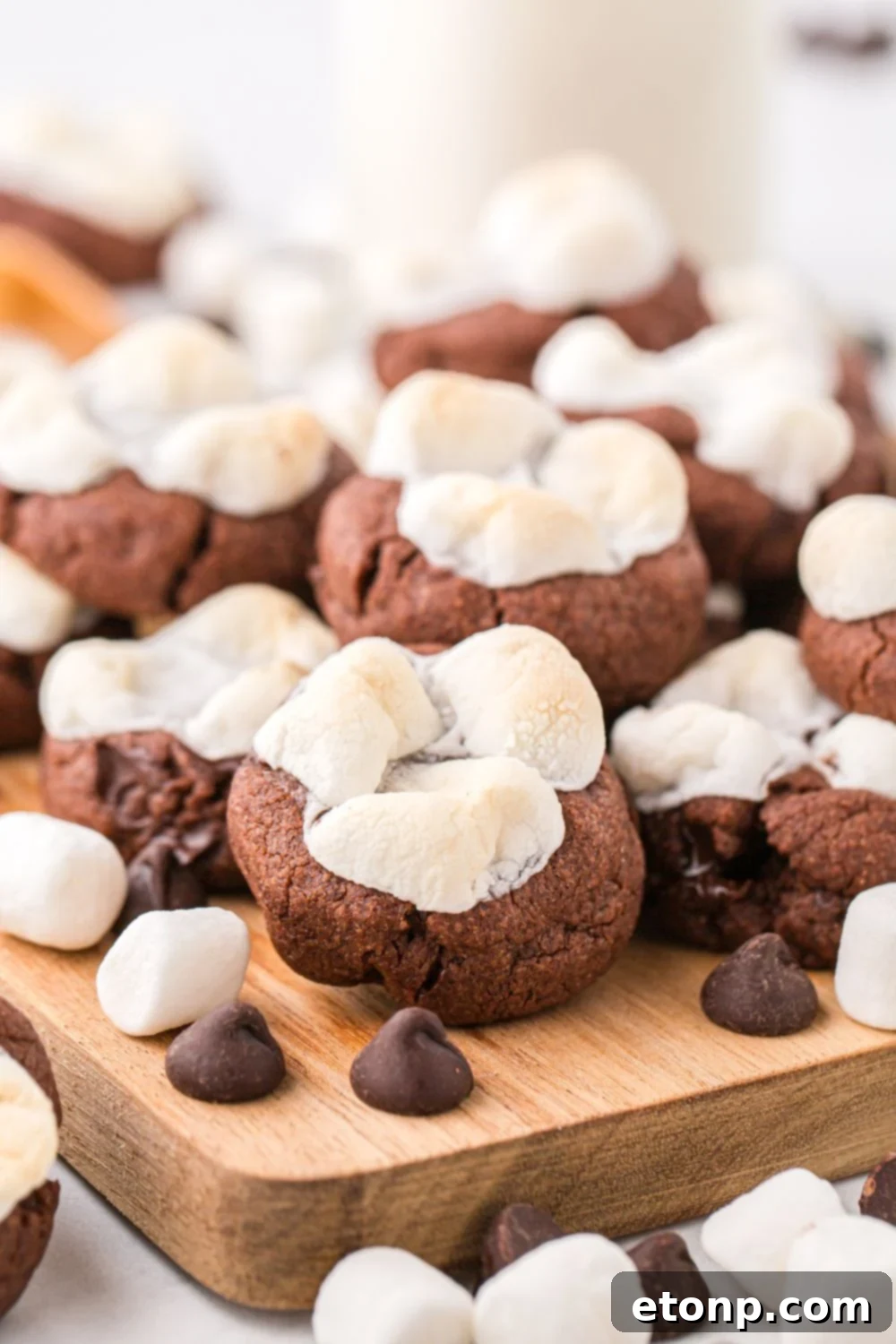 Hot chocolate cookies arranged on a wooden tray, ready for serving.