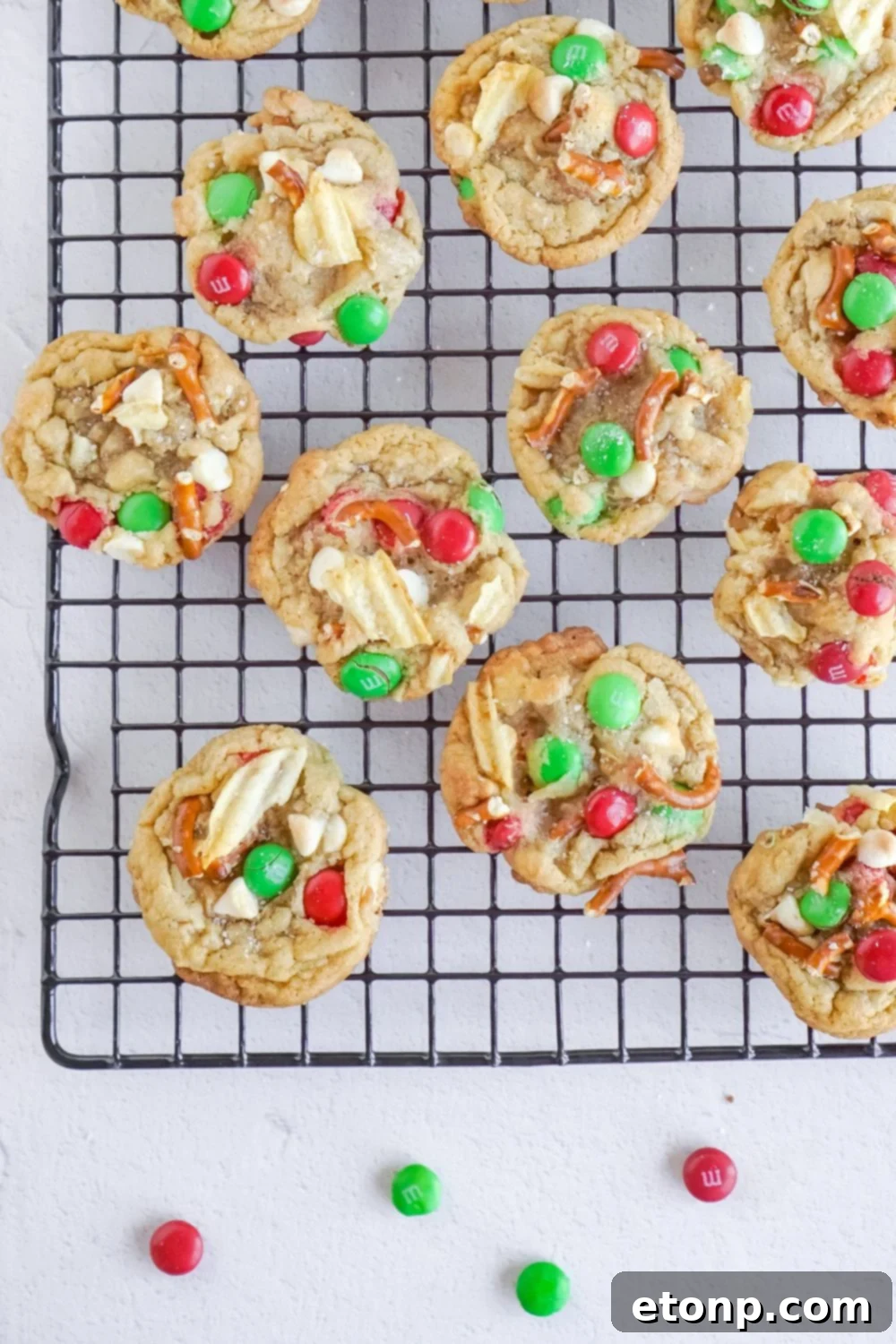 cooked Christmas cookies on a metal cooling rack